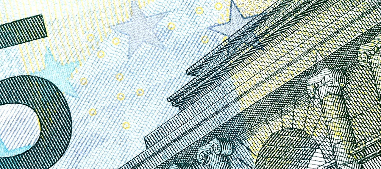 A cropped close up of an illustration of money.